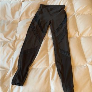 Gray alo yoga leggings with mesh design